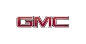 The image shows the GMC logo with bold, red letters outlined in silver on a white background.